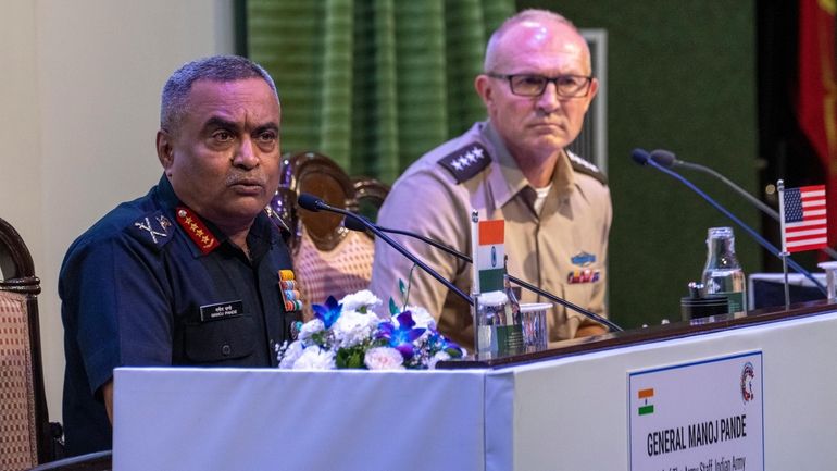 Indian Army chief Gen. Manoj Pande, left, speaks as Chief...