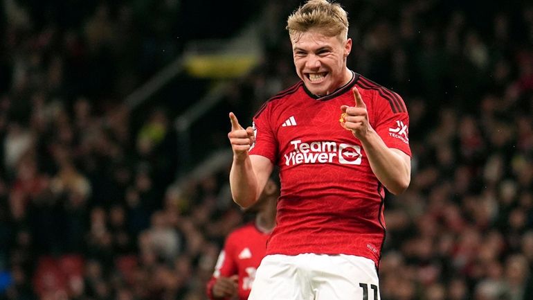 Manchester United's Rasmus Hojlund celebrates scoring their side's fourth goal...