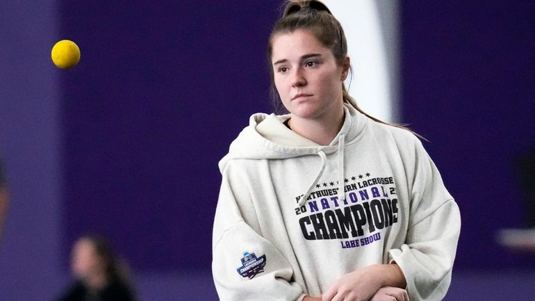 Northwestern lacrosse player Izzy Scane watches a ball during practice...