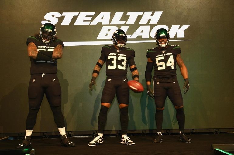 New York Jets players model the new Jets NFL football uniforms when the New  York Jets host a Uniform Launch Event at Gotham Hall in New York City on  April 4, 2019.