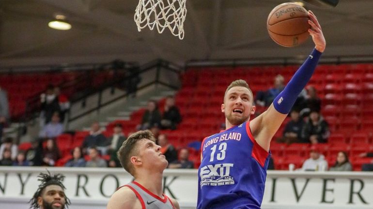 Long Island Nets guard Dzanan Musa #13 goes up for...