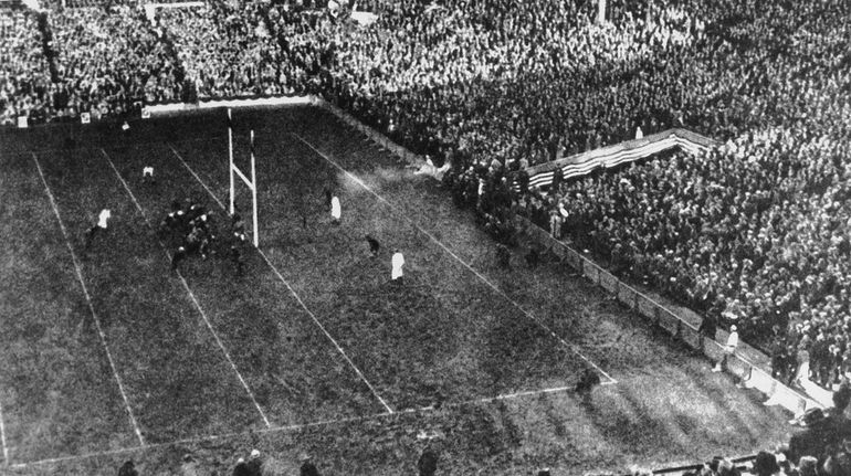 The Polo Grounds with more than 70,000 fans and 125...