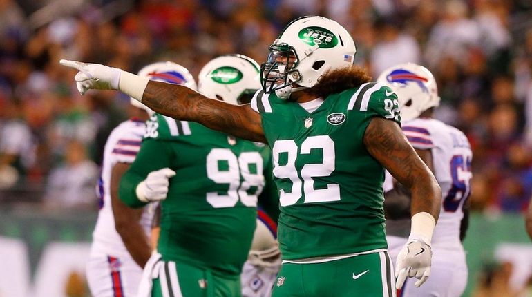 Jets defensive end Leonard Williams reacts after sacking Bills quarterback...