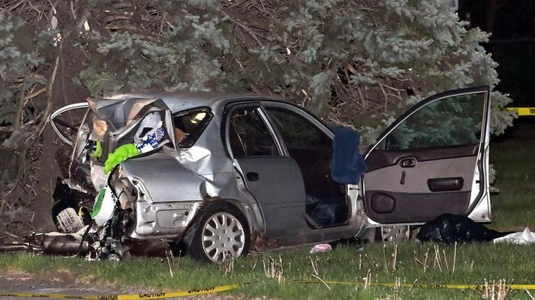 The scene of the fatal car crash on Middle Country Road in...