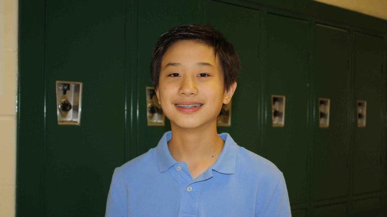 Bryant Liu, 13, a freshman at Rocky Point High School,...