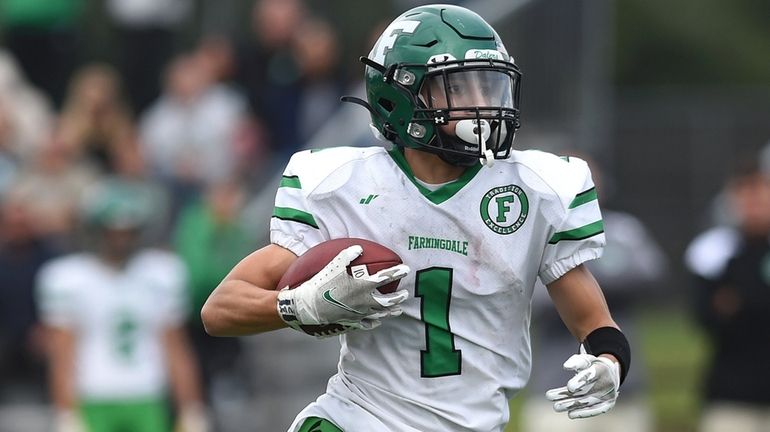 Tomaso Ramos, Farmingdale running back, dashes downfield after finding an...