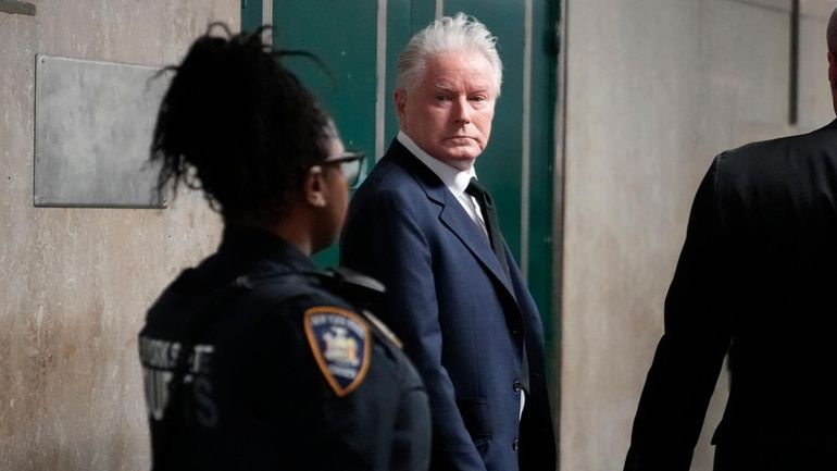 Musician Don Henley leaves Supreme Court during lunch break, Monday,...