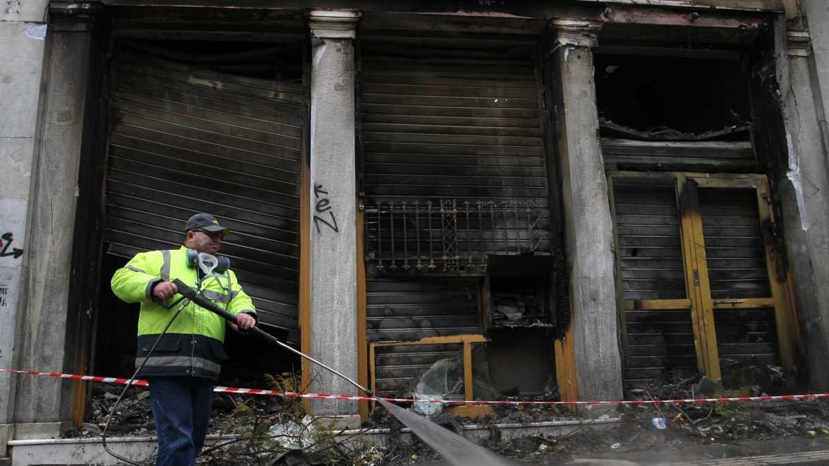 Greeks clean up after riots against austerity vote - Newsday