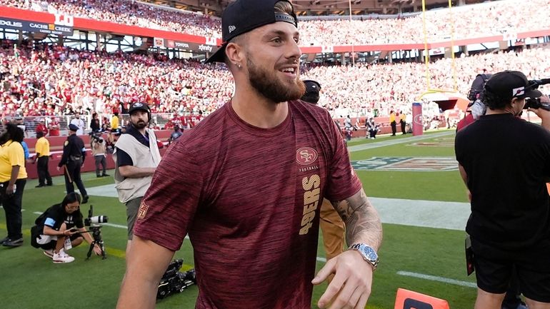 San Francisco 49ers wide receiver Ricky Pearsall walks on the...