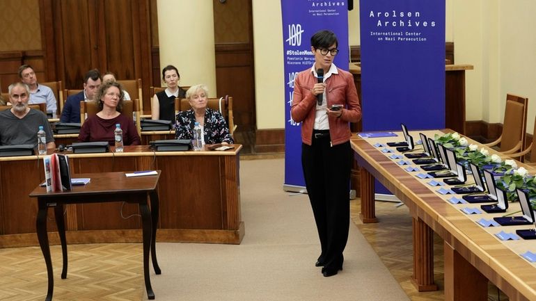 The director of Germany's Arolsen Archives, Floriane Azoulay, talks to...