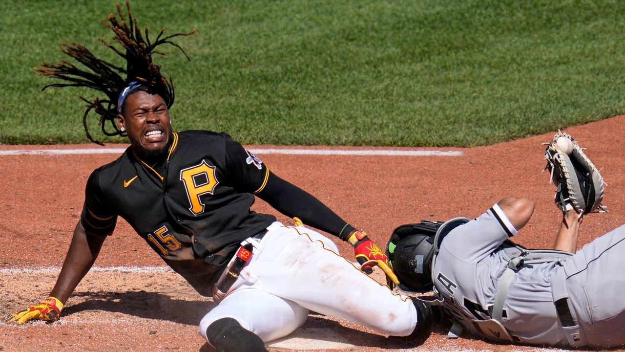 Pirates SS Oneil Cruz injured in home-plate collision - Newsday