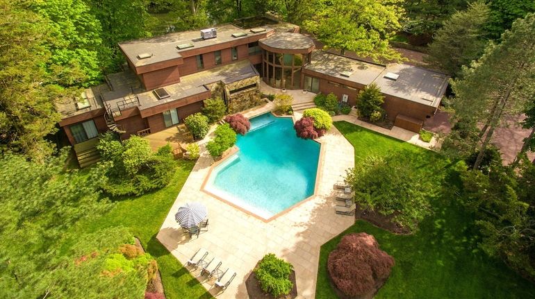 An Old Westbury home listed for $5.128 million comes with...