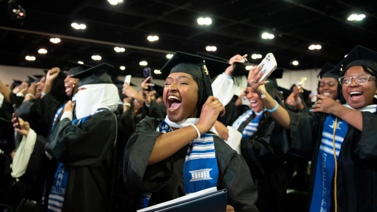 Participants in the Spelman College 136th Commencement celebrate in College...