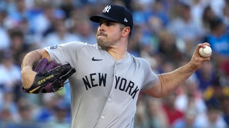 Carlos Rodón of the Yankees throws in the first inning against the...