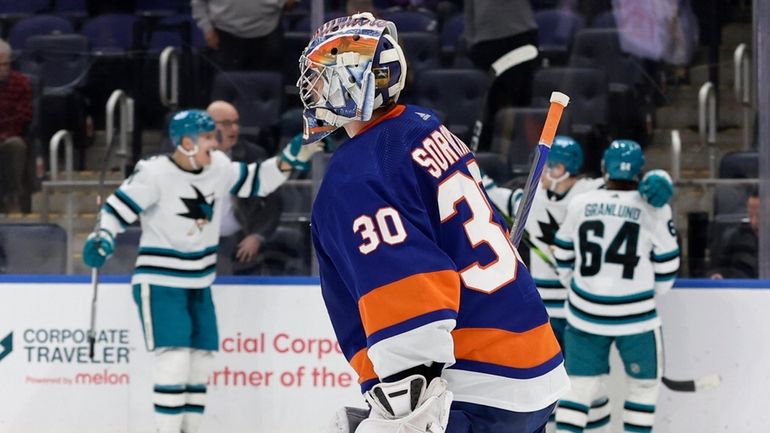 Ilya Sorokin #30 of the Islanders skates off the ice...