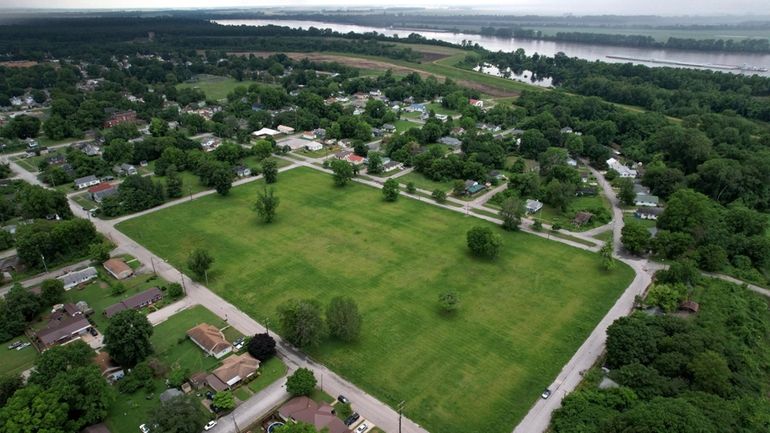 A vacant lot where, until recently, residences stood as a...