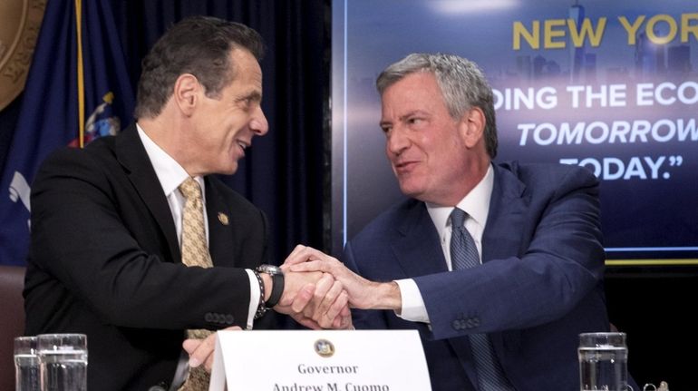 Gov. Andrew M. Cuomo and New York City Mayor Bill...