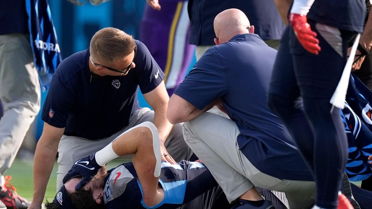 Titans LB Jack Gibbens carted off field with injured right ankle in an ...