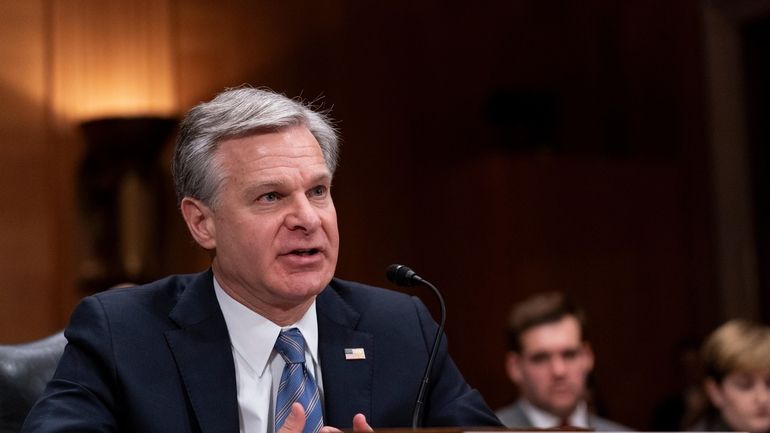 FBI Director Christopher Wray testifies during a Senate Homeland Security...