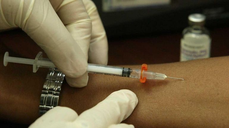 A patient is screened for TB at Elmhurst Hospital.