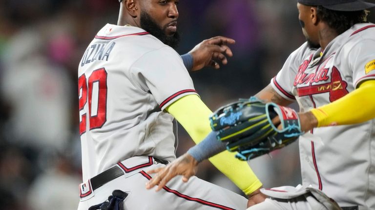 Marcel Ozuna hits 30th homer, MLB-leading Braves beat Rockies 3-1