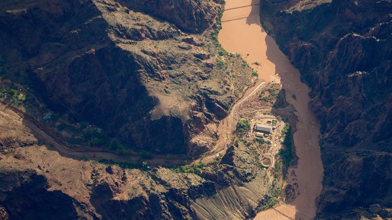 Rescuers saved some 80 people in Grand Canyon floods that left 2