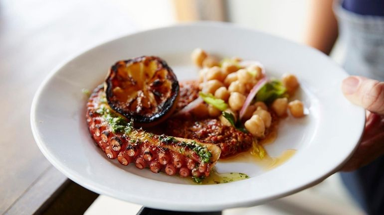 Charred octopus with lemon and chickpeas at Lost & Found...