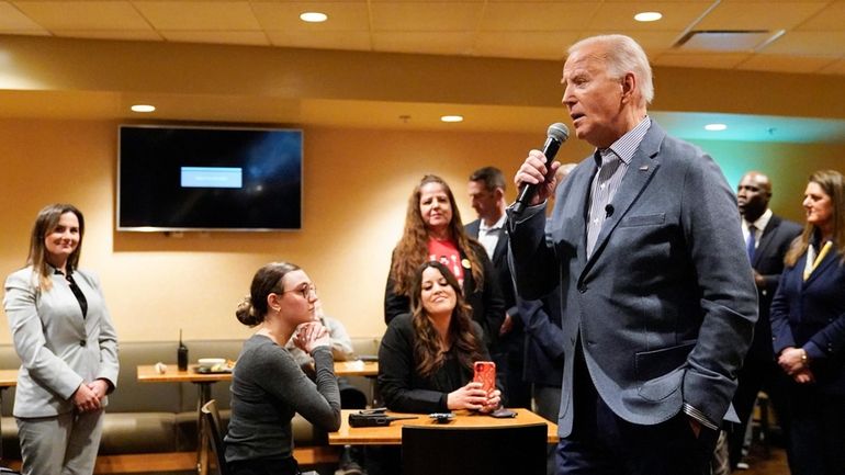 President Joe Biden meets with members of the Culinary Workers...