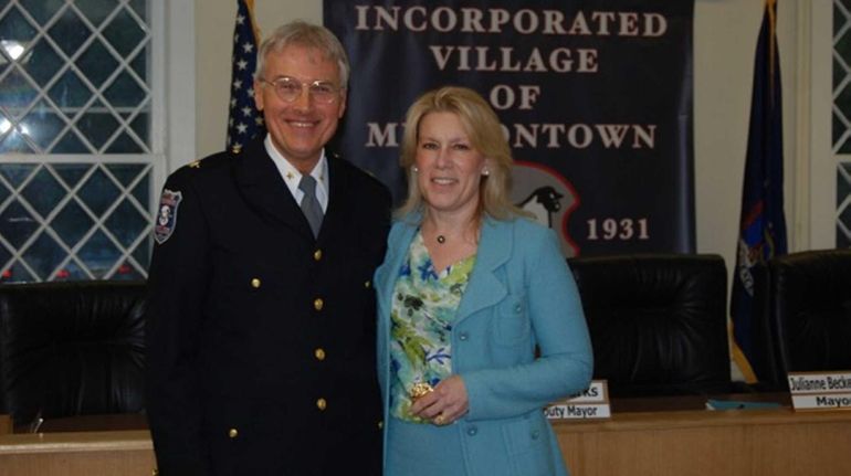 Muttontown Police Chief Phil T. Pulaski and Mayor Julianne W....