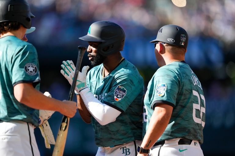 American League's Kyle Tucker, of the Houston Astros, catches a fly ball  during the MLB All-Star baseball game against the National League in  Seattle, Tuesday, July 11, 2023. (AP Photo/Lindsey Wasson Stock