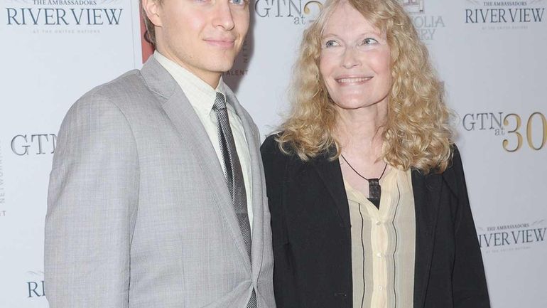 Ronan Farrow and his mother, actress Mia Farrow, attend the...
