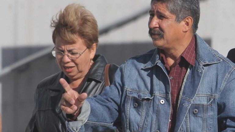 Alvaro Zea and Sandra Zea leave court in Central Islip...