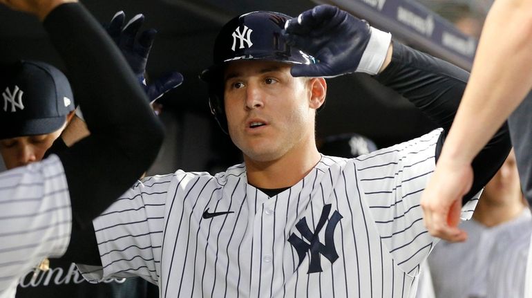 Anthony Rizzo of the Yankees celebrates his fourth-inning home run...