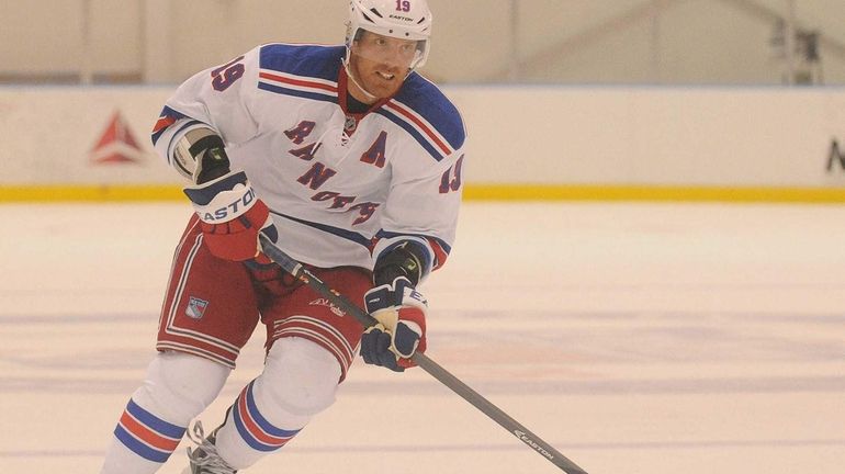 Rangers No. 19 Brad Richards skates down ice during the...