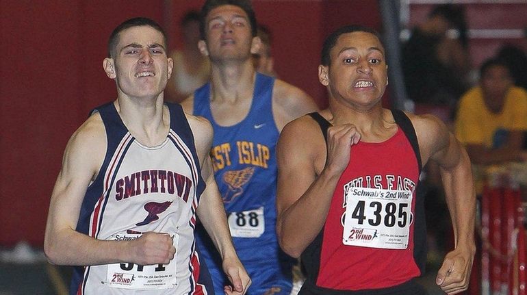 Matthew Villano of Smithtown West overtakes Christian Sam of Half...