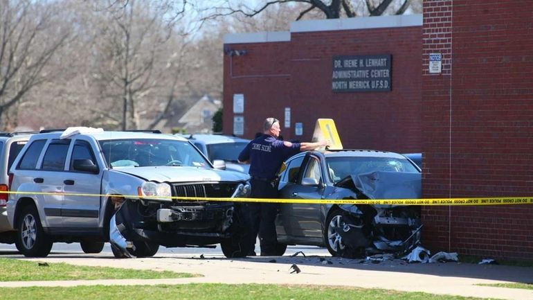 Nassau police investigate the scene at Harold D. Fayette School...