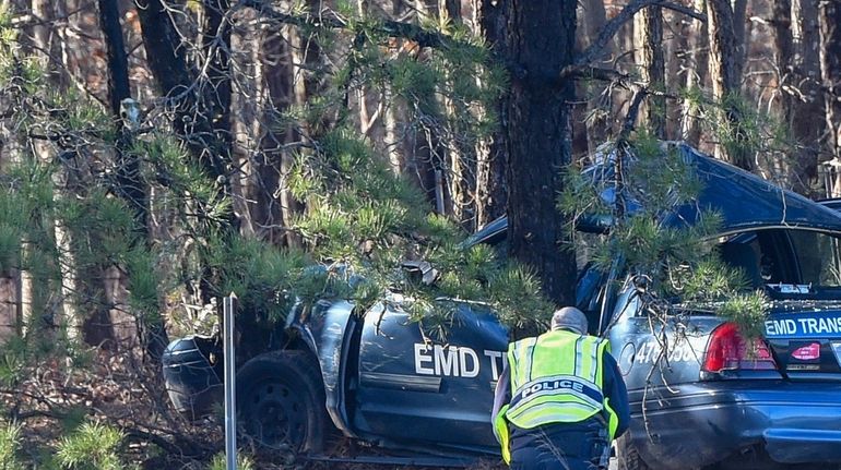 The scene of Wednesday's fatal crash on the eastbound Long Island Expressway in...