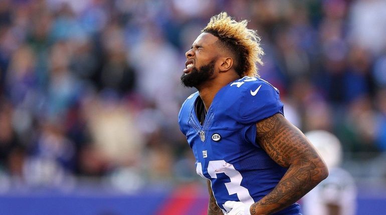 Odell Beckham Jr. #13 of the New York Giants reacts...