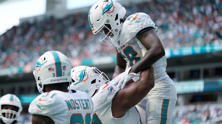 Dolphins set numerous records in their blowout win over Broncos but miss  out on a few more