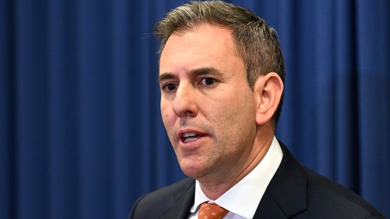 Australia's Federal Treasurer Jim Chalmers speaks to the media during...