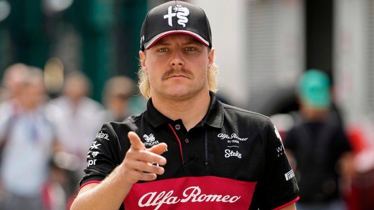 Alfa Romeo driver Valtteri Bottas of Finland gestures at the...