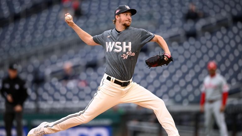 Washington Nationals starting pitcher Erick Fedde throws during the first...