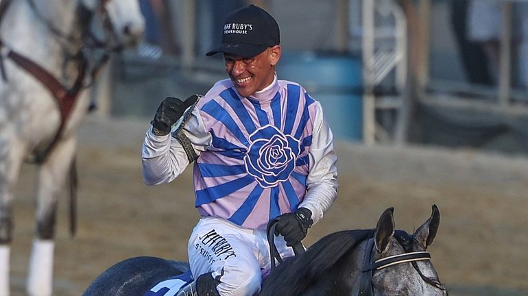 Jockey Javier Castellano, riding Archangelo, wins the 155th running of...