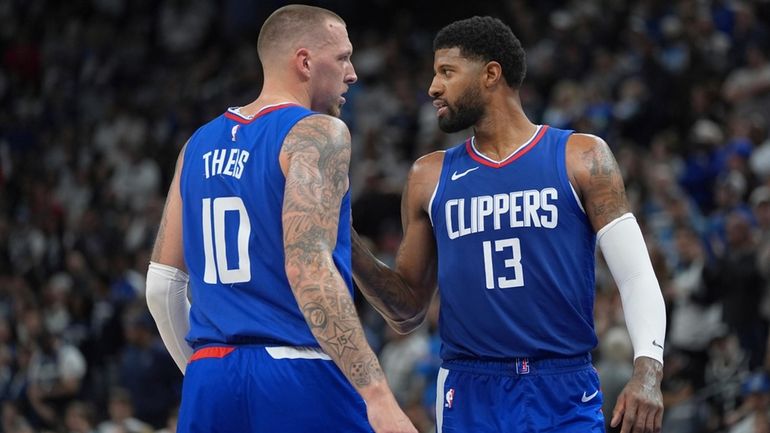 Los Angeles Clippers center Daniel Theis (10) and forward Paul...