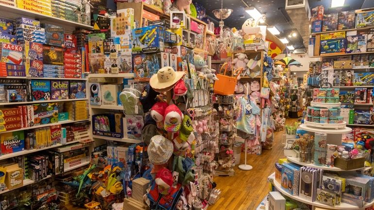 Einstein's Attic in Northport on Monday. Toys that got wet during...