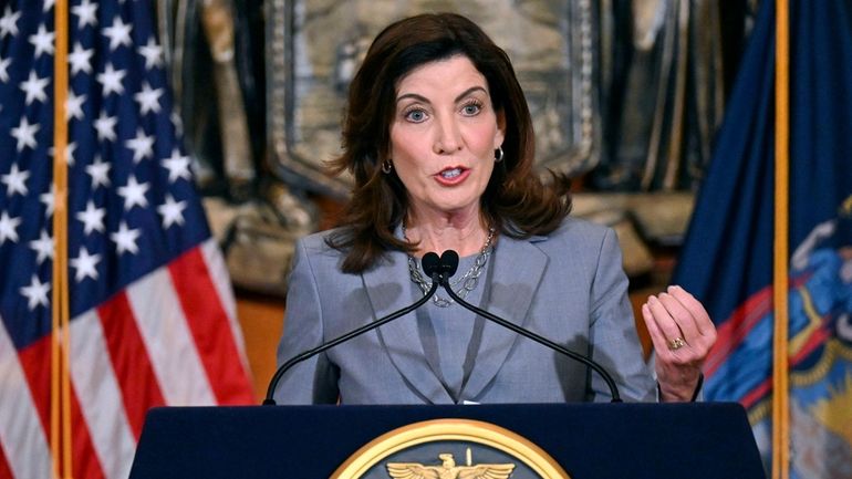 Gov. Kathy Hochul speaks to reporters about legislation passed during...