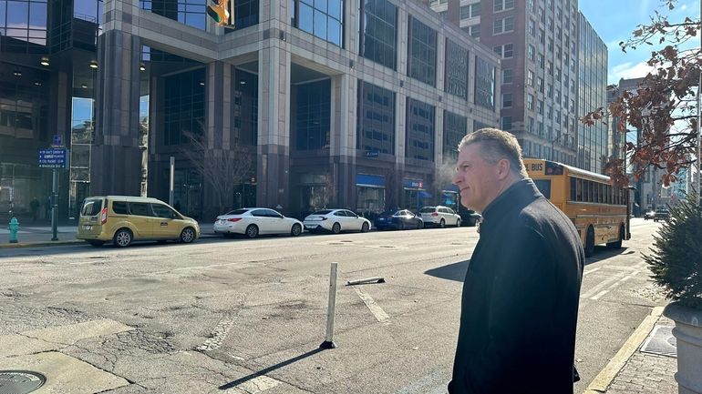 Former Indiana Rep. Sean Eberhart leaves a hearing at the...