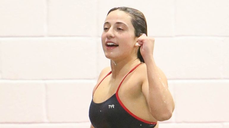 Hauppauge-Smithtown’s Leah Treglia after winning the 100 yard freestyle during...