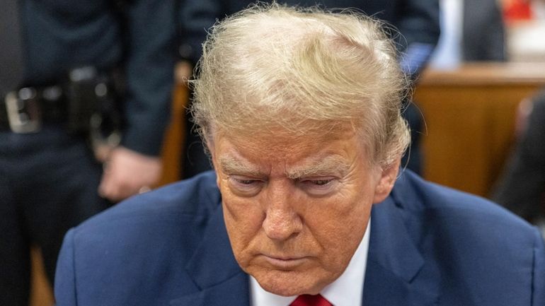 Former President Donald Trump appears at Manhattan criminal court before...