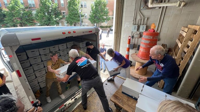 Volunteers with Citizens Not Politicians deliver petitions to change Ohio's...